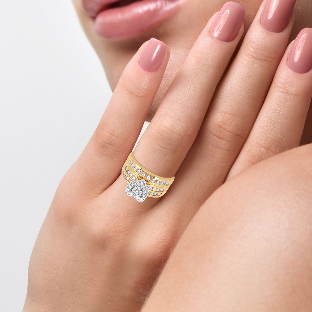 Armonía sincera: juego de boda con trío de diamantes de 1,44 quilates en oro amarillo de 14 quilates