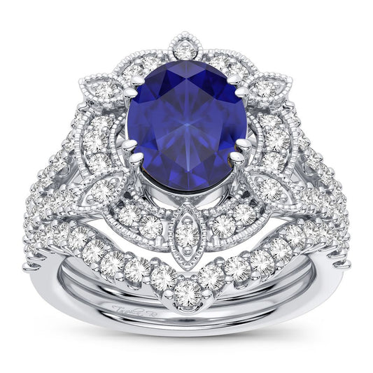 Regal Indigo Majesty: 14K White Gold 0.90ct Diamond and Sapphire Ring