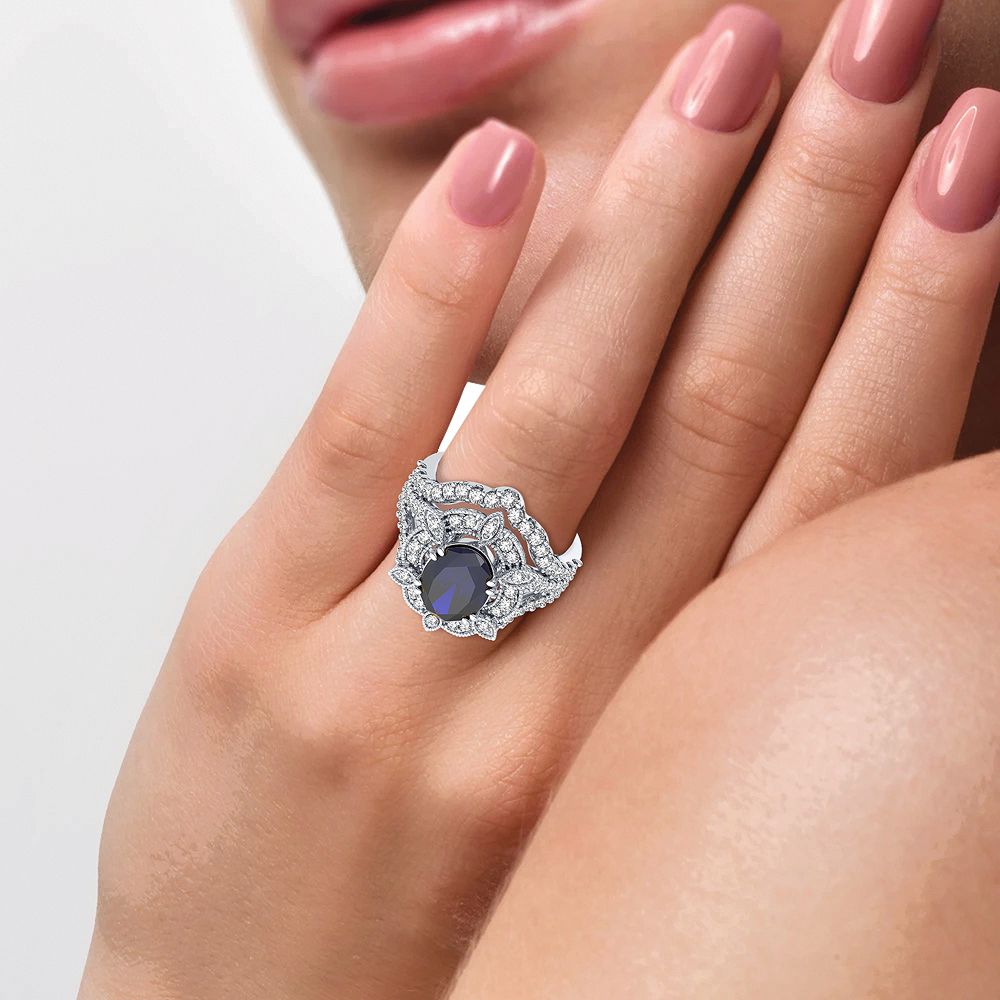 Regal Indigo Majesty: 14K White Gold 0.90ct Diamond and Sapphire Ring