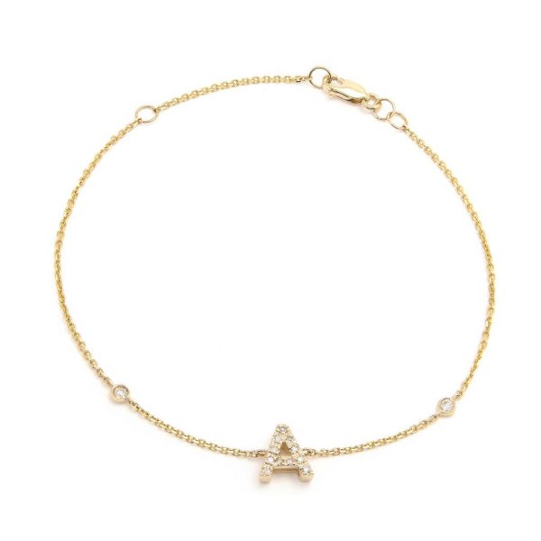 Pulsera con dijes de letras en oro de 14 quilates con diamantes: AZ