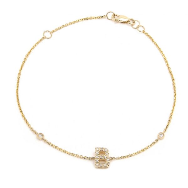 Pulsera con dijes de letras en oro de 14 quilates con diamantes: AZ