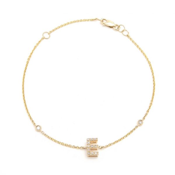 Pulsera con dijes de letras en oro de 14 quilates con diamantes: AZ