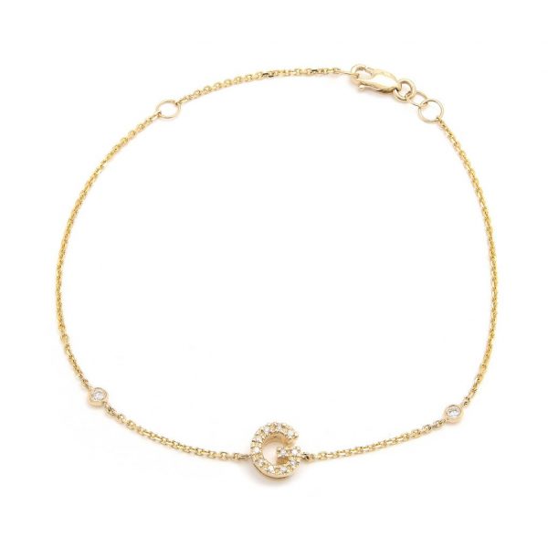 Pulsera con dijes de letras en oro de 14 quilates con diamantes: AZ