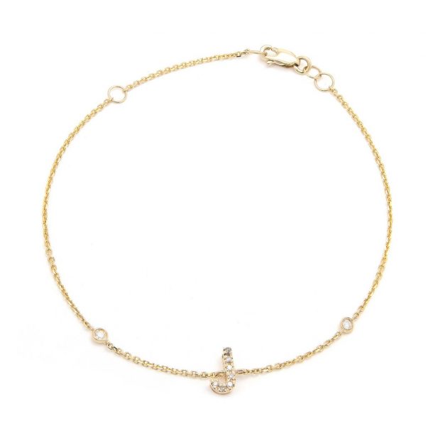 Pulsera con dijes de letras en oro de 14 quilates con diamantes: AZ