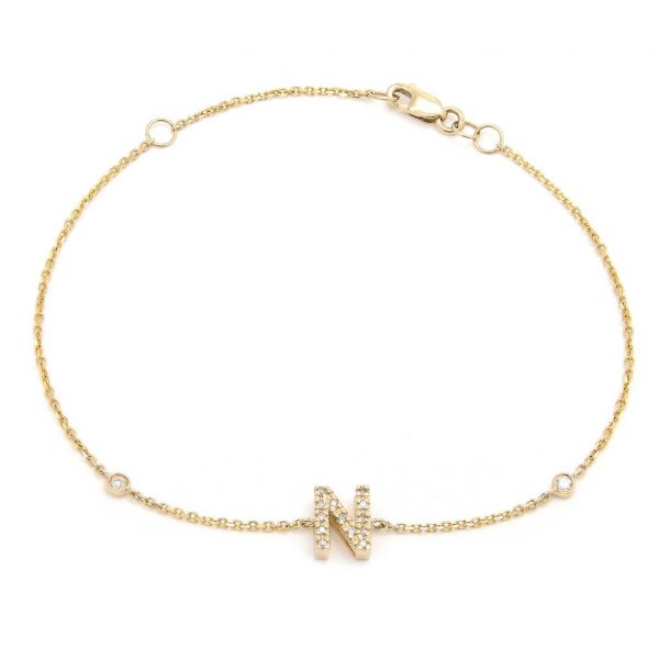 Pulsera con dijes de letras en oro de 14 quilates con diamantes: AZ