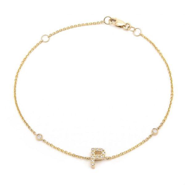 Pulsera con dijes de letras en oro de 14 quilates con diamantes: AZ