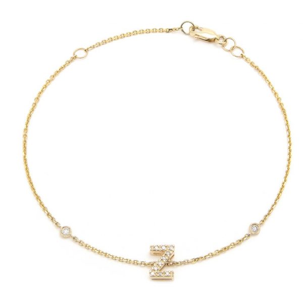 Pulsera con dijes de letras en oro de 14 quilates con diamantes: AZ