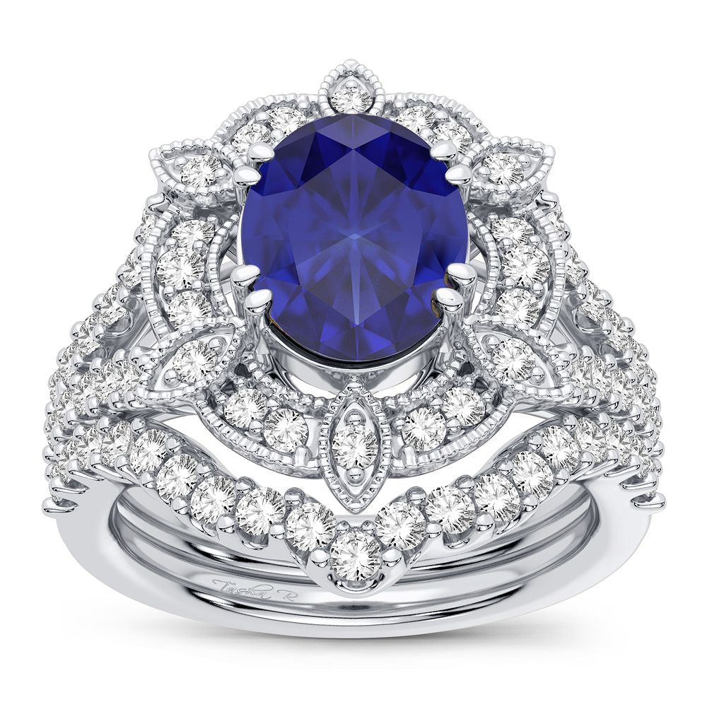 Regal Indigo Majesty: 14K White Gold 0.90ct Diamond and Sapphire Ring